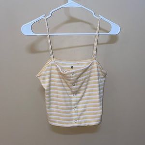 Slightly cropped yellow and white tank top